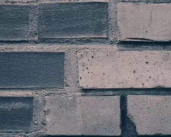 Eroded Order The structure remains legible, but its authority weakens. Repetition persists while surface and alignment quietly degrade.