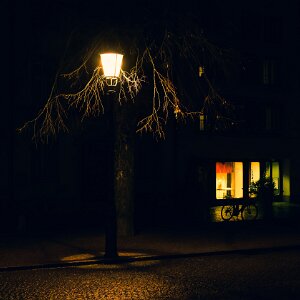Lights : Night photography exploring artificial light, shadow, and atmosphere through quiet urban scenes and illuminated...