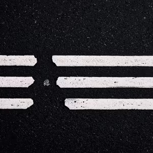 Tolerance A minimalist photographic series exploring painted street markings up close, revealing the subtle imperfections hidden...
